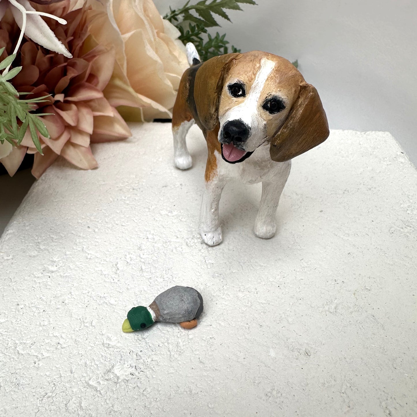 Handmade beagle wedding cake topper with soft toy.