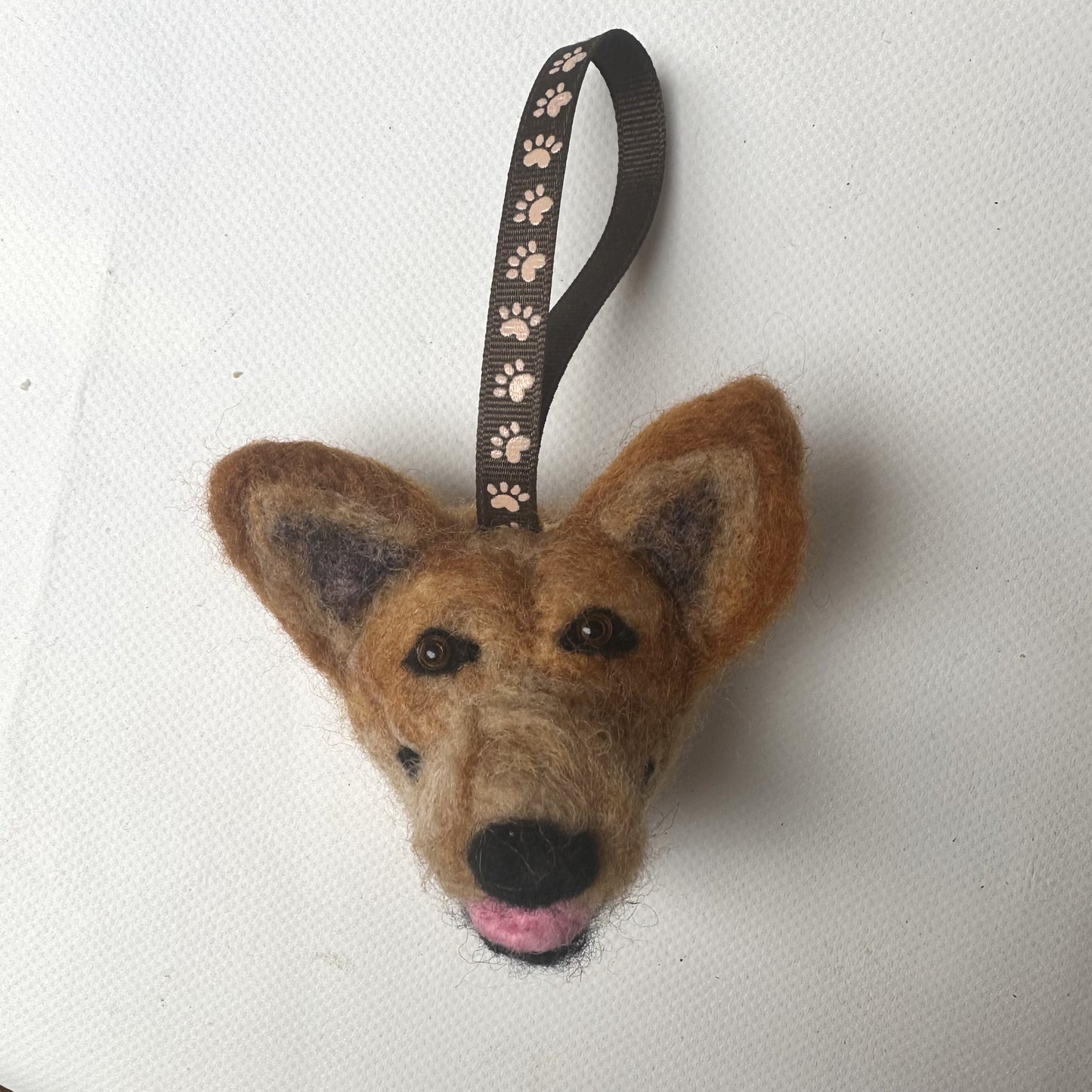 Custom needle-felted Christmas tree ornament of a dog face