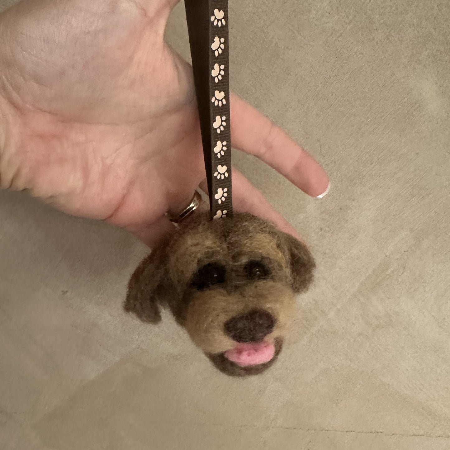 Custom needle-felted Christmas tree ornament of a dog face