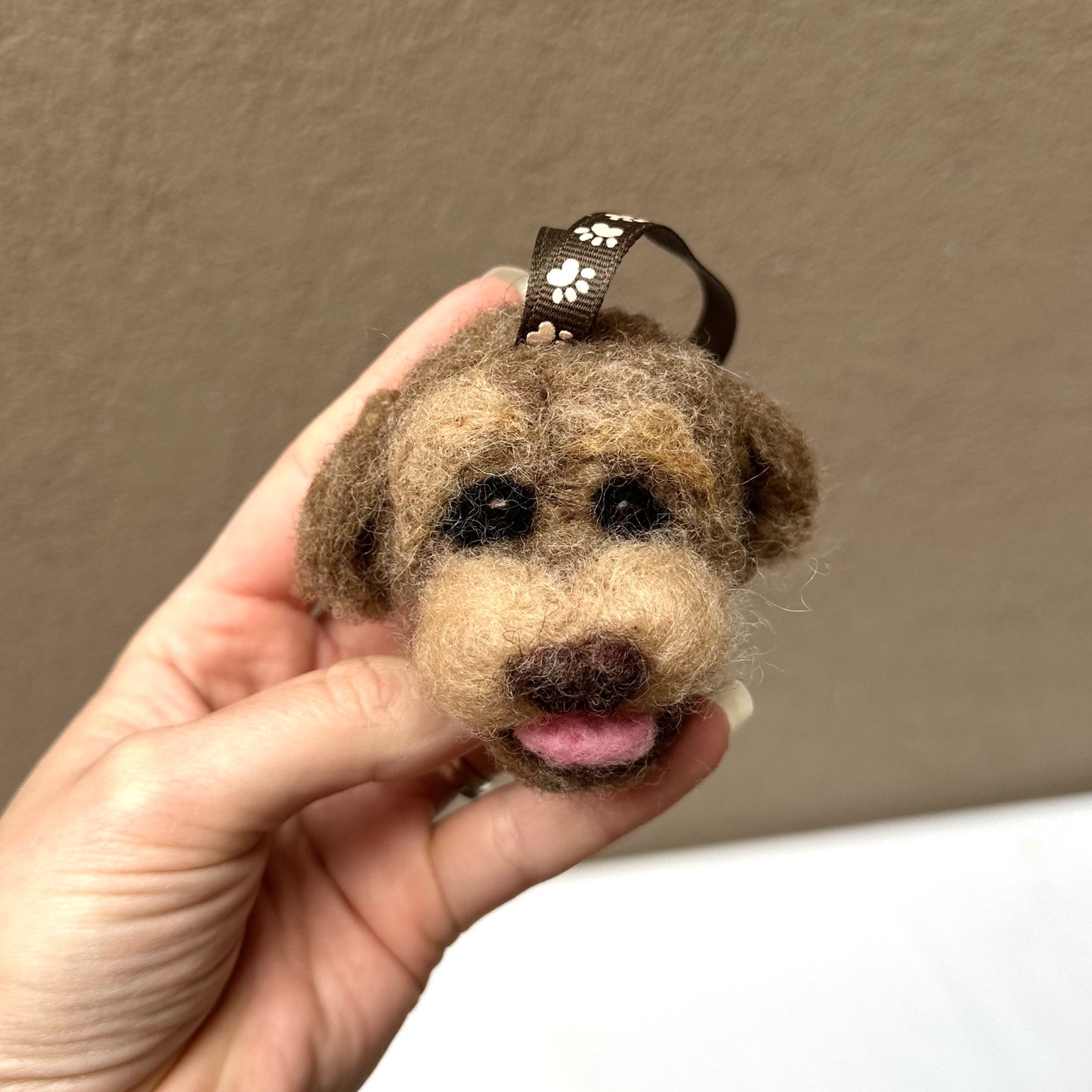 Custom needle-felted Christmas tree ornament of a dog face
