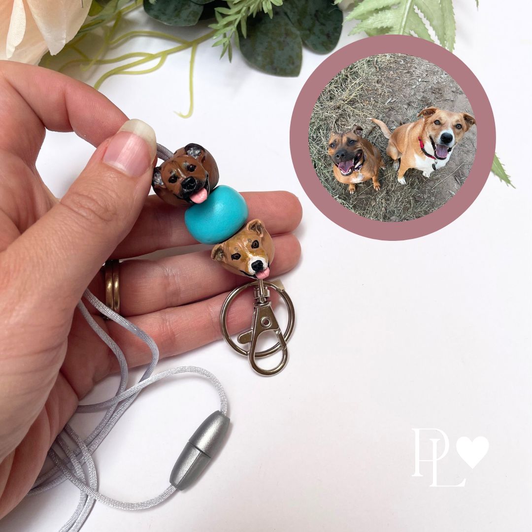 Handmade custom pet face lanyard showing 2 dog faces.
