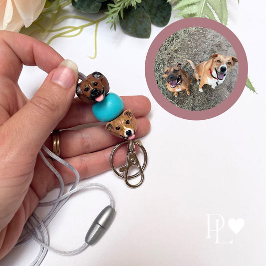 Handmade custom pet face lanyard showing 2 dog faces.