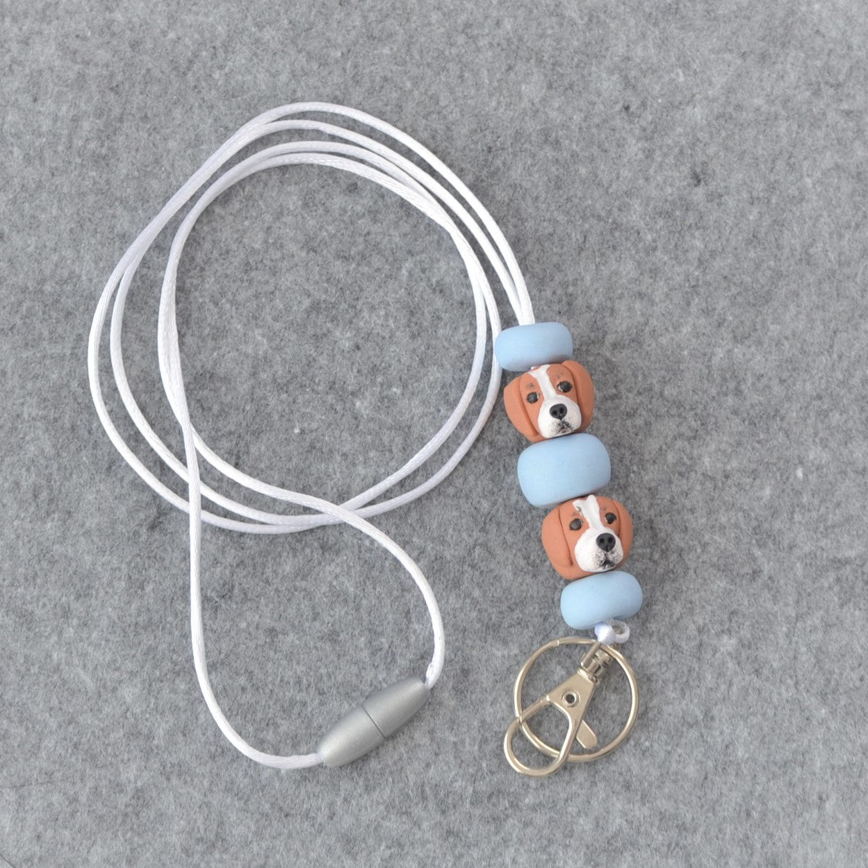 Custom dog handmade lanyard on felt background