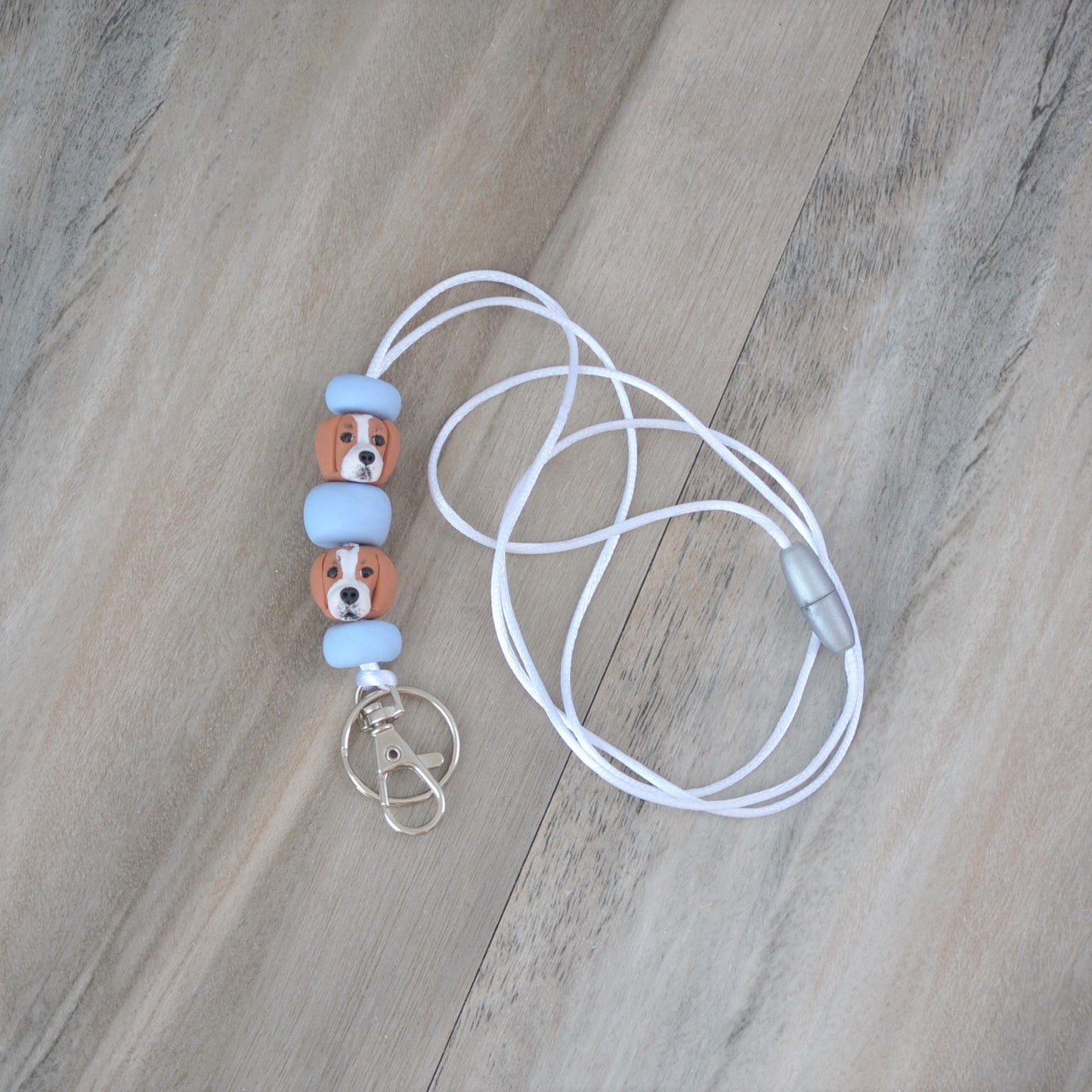 Custom dog handmade lanyard on timber background
