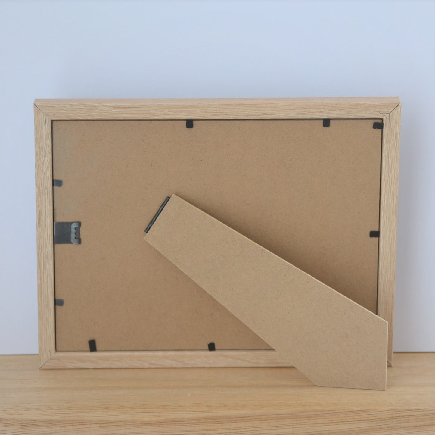 Back of oak coloured pet memorial photo frame