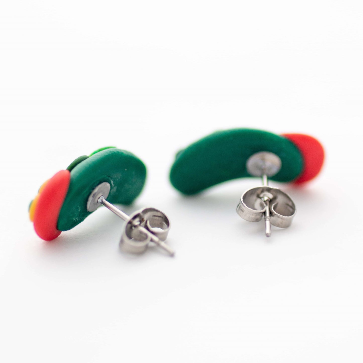 Caterpillar stud earring backs showing surgical steel posts