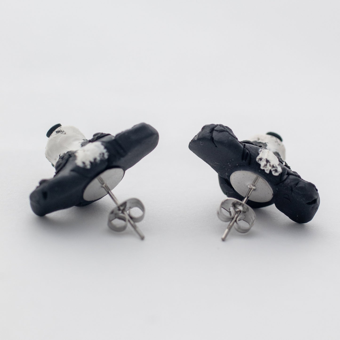 Handmade border collie dog earrings showing surgical steel backs