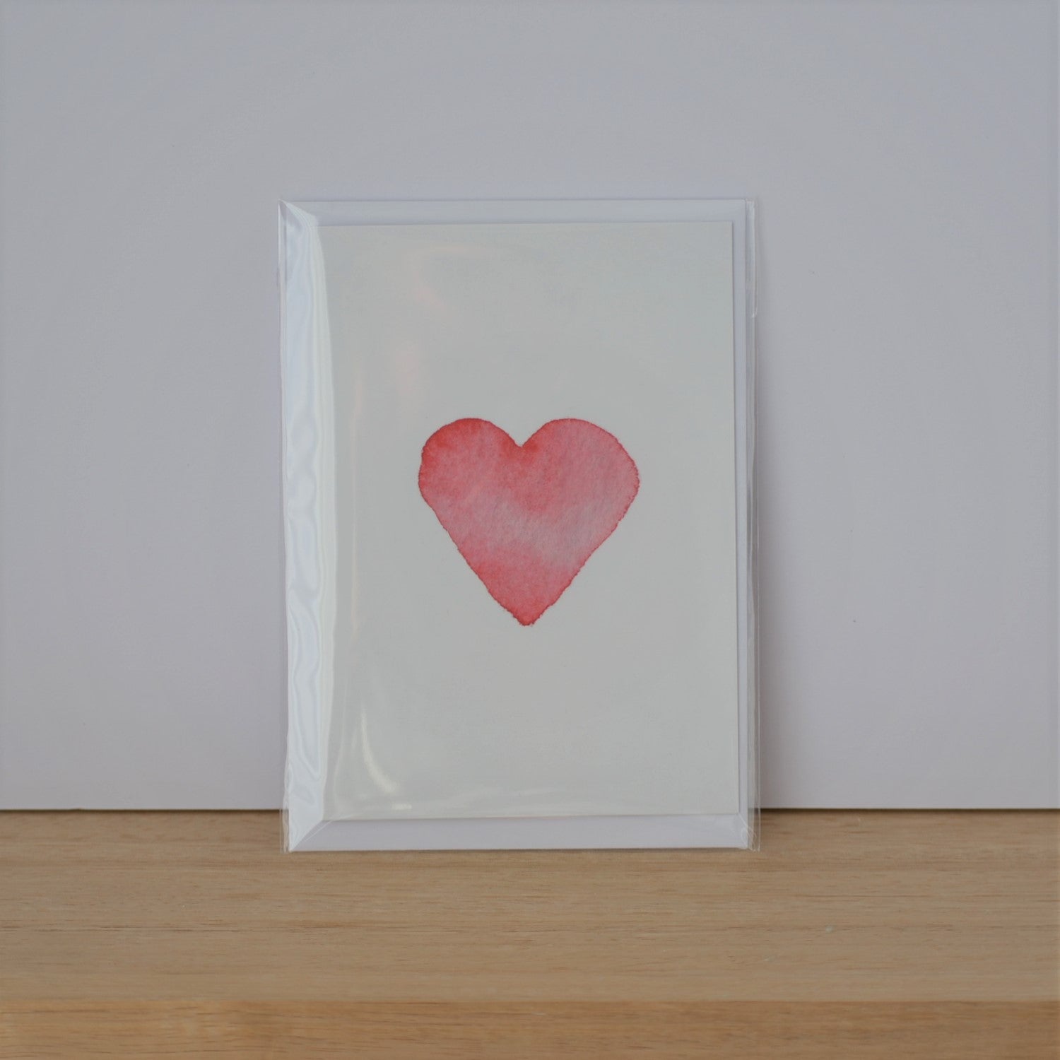 Watercolour heart print on the front of a greeting card