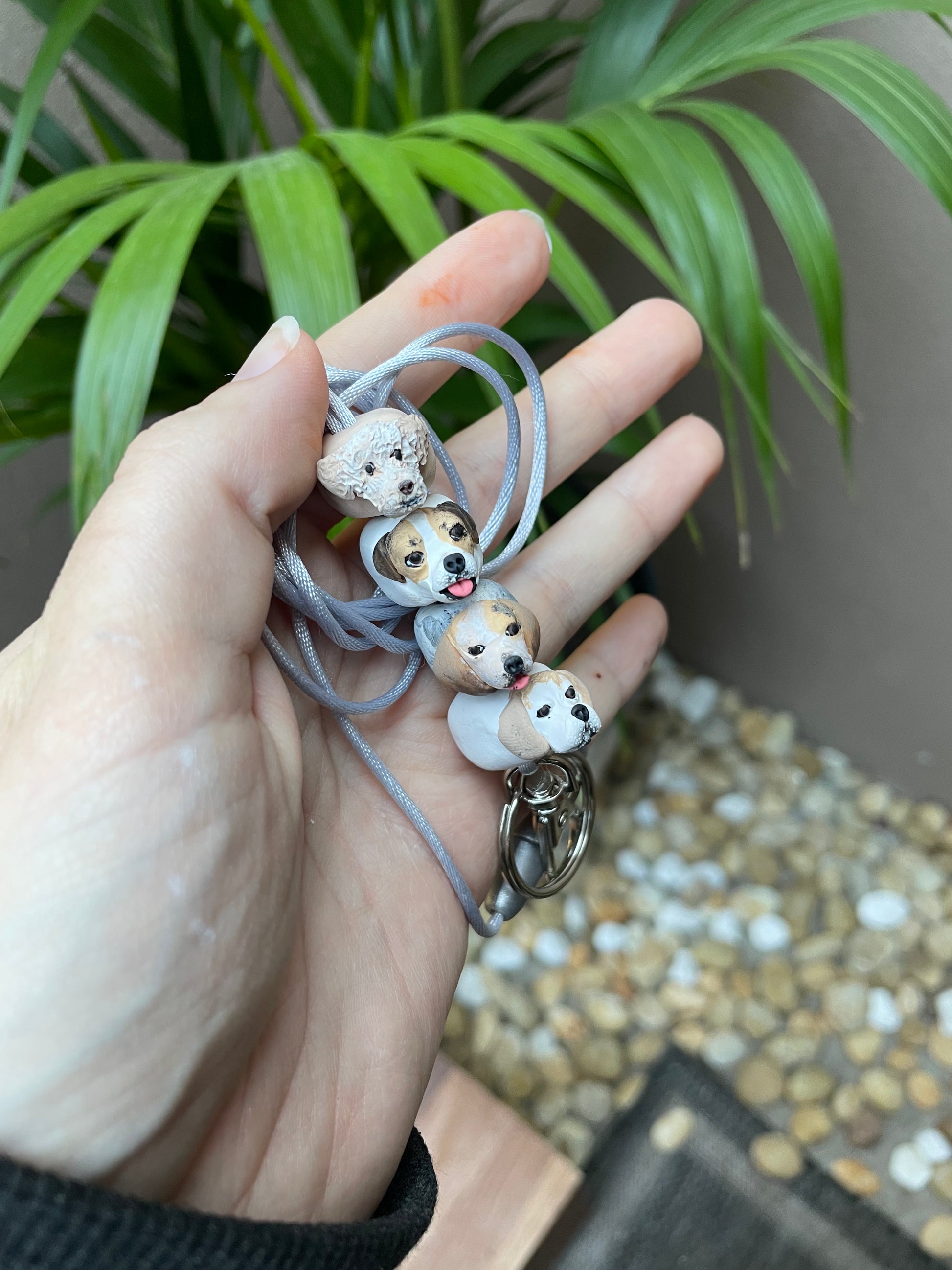 Handmade custom pet face lanyard showing 4 dog faces.