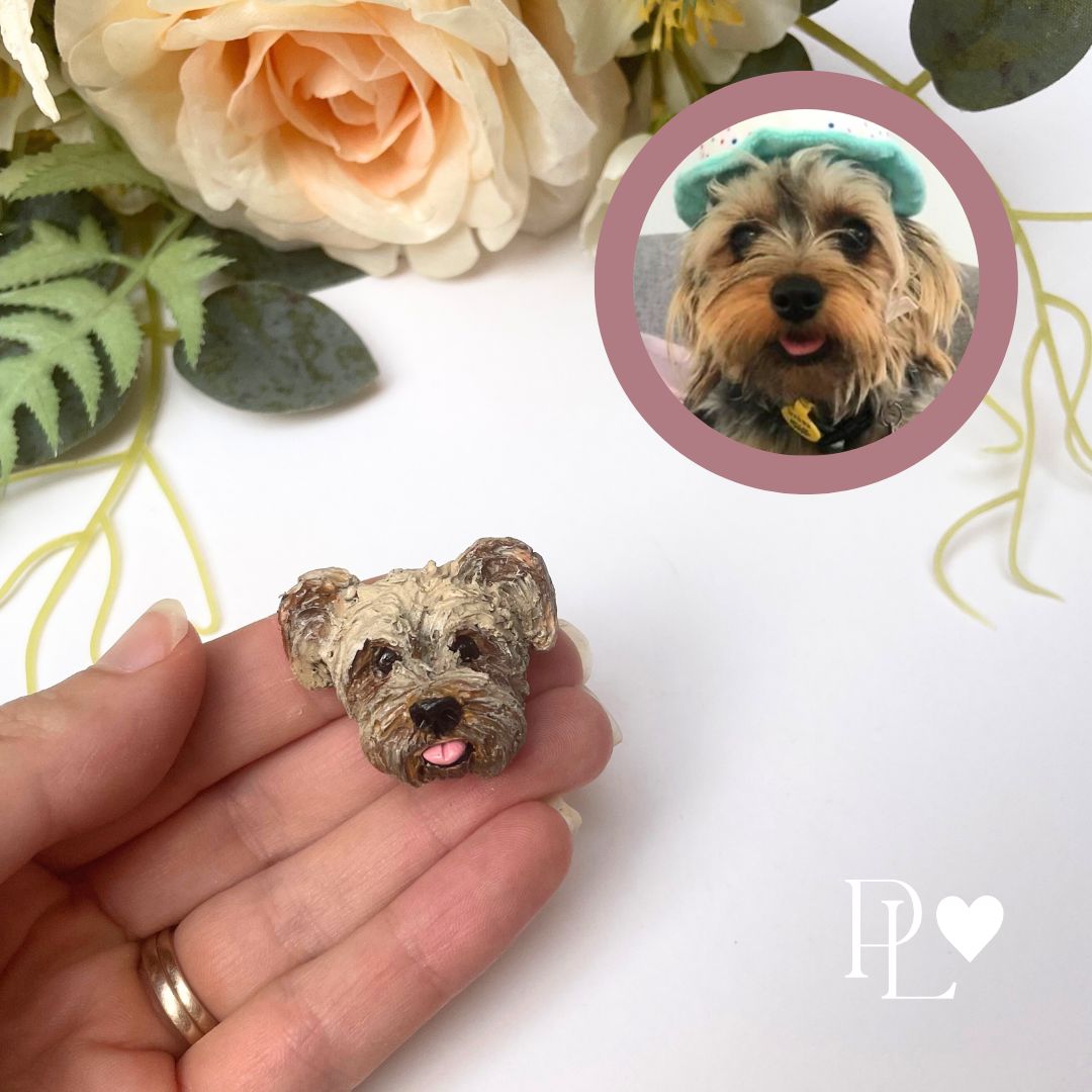 Handmade polymer clay pet memorial fridge magnet, made to look like a terrier dog.