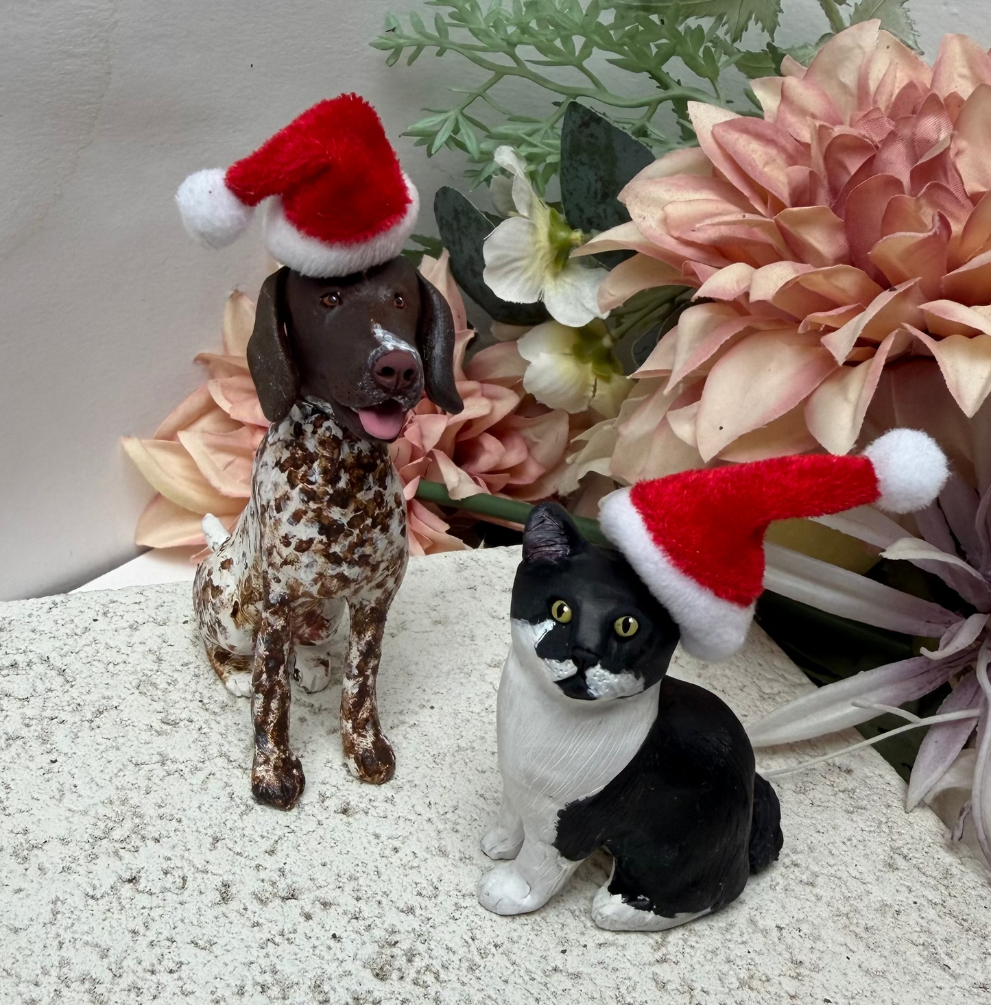 Custom Christmas dog figurine wearing Santa Hat