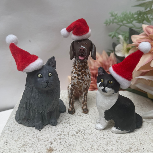 Custom Christmas dog figurine wearing Santa Hat