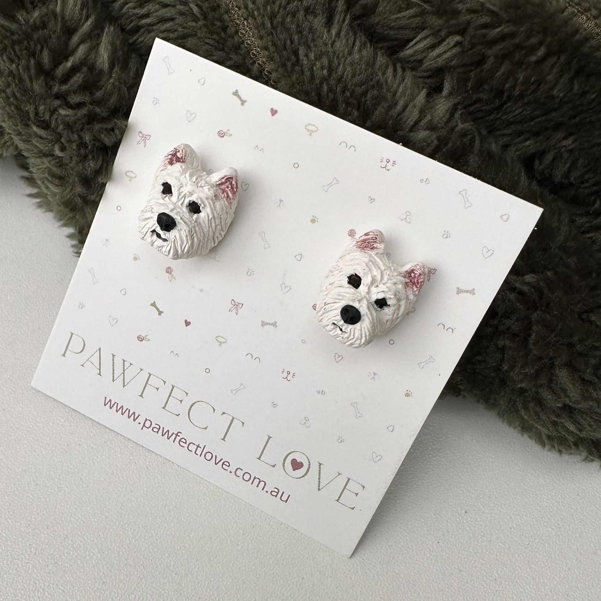 Westie Dog-shaped earrings on a 'Pawfect Love' branded card with a soft background