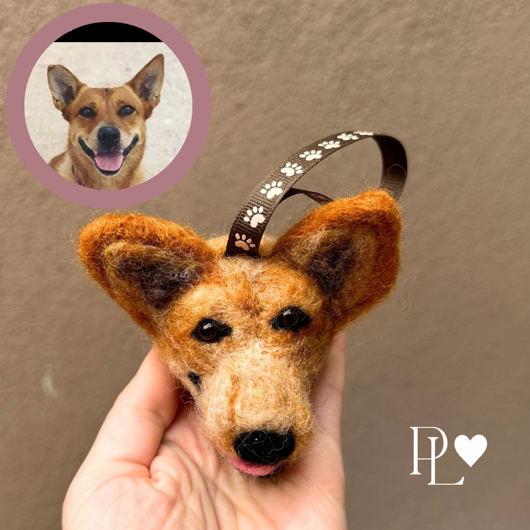 Custom needle-felted Christmas tree ornament of a Red Heeler dog face