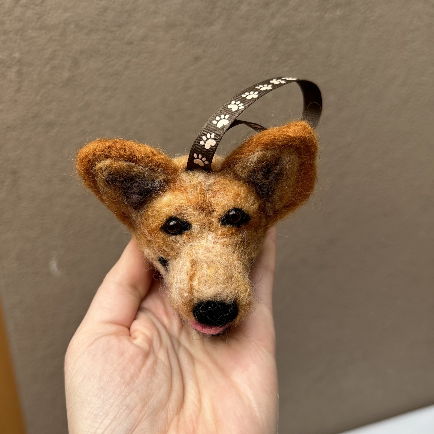 Custom needle-felted Christmas tree ornament of a dog face