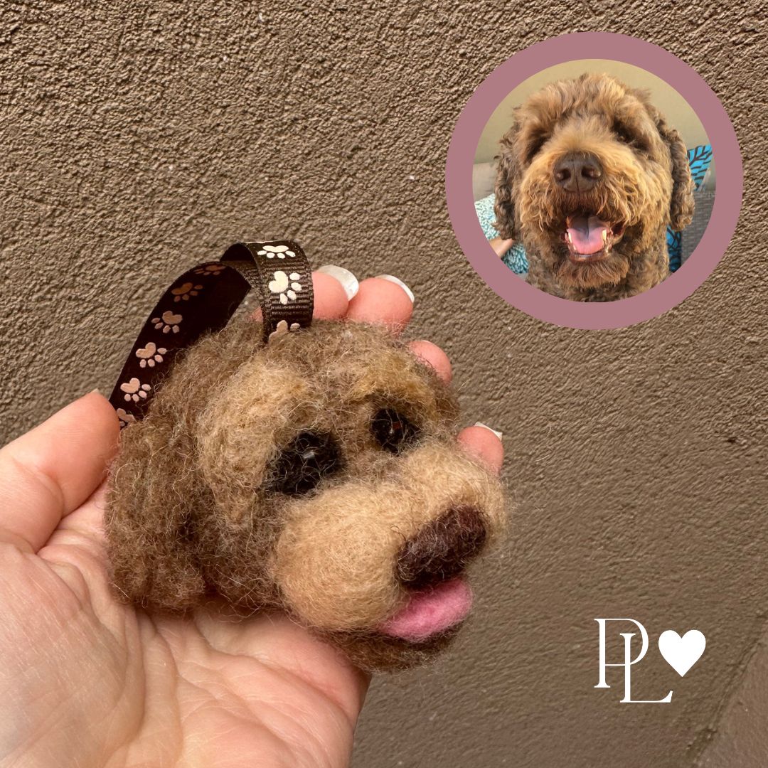 Custom needle-felted Christmas tree ornament of a dog face