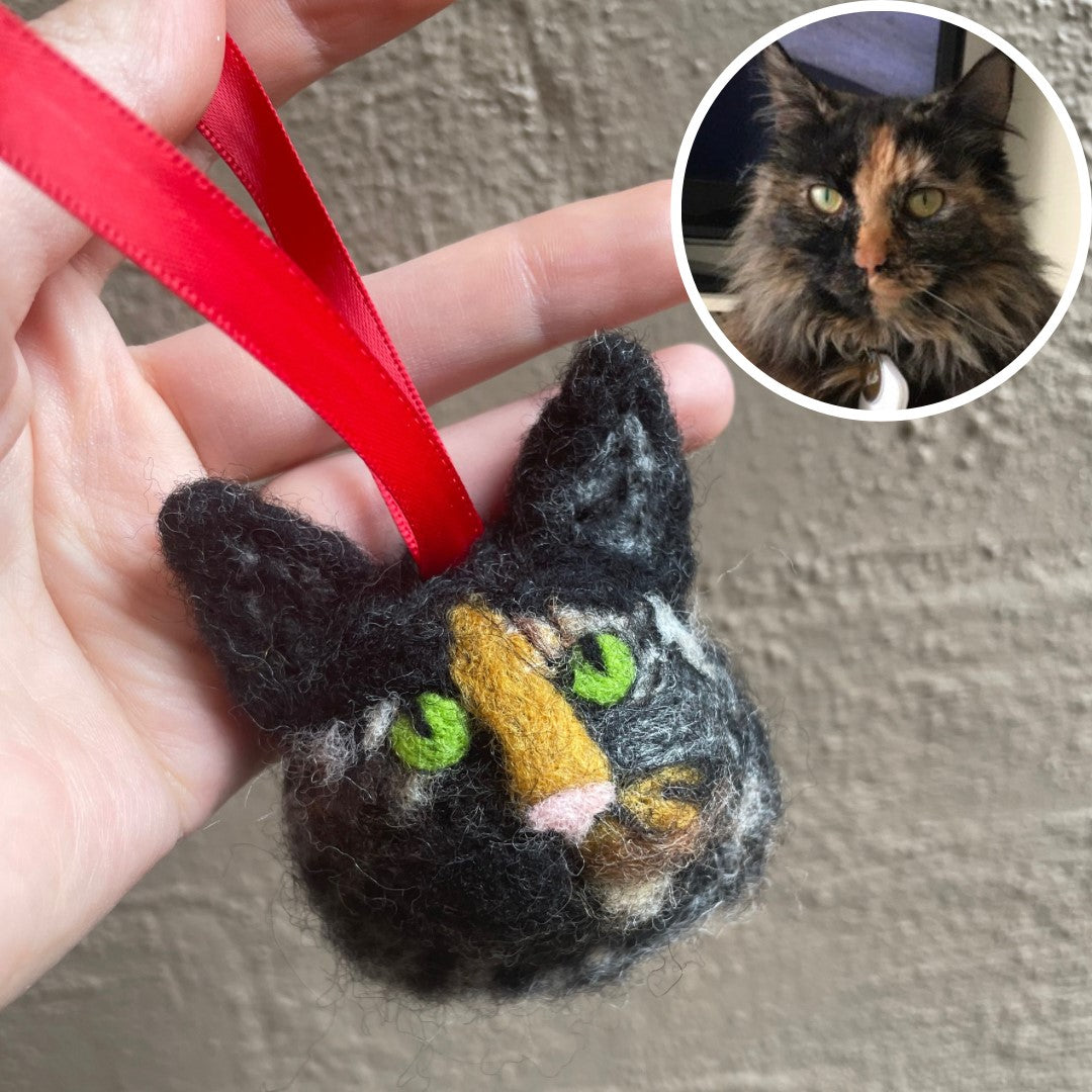 Custom needle-felted Christmas tree ornament of a cat face