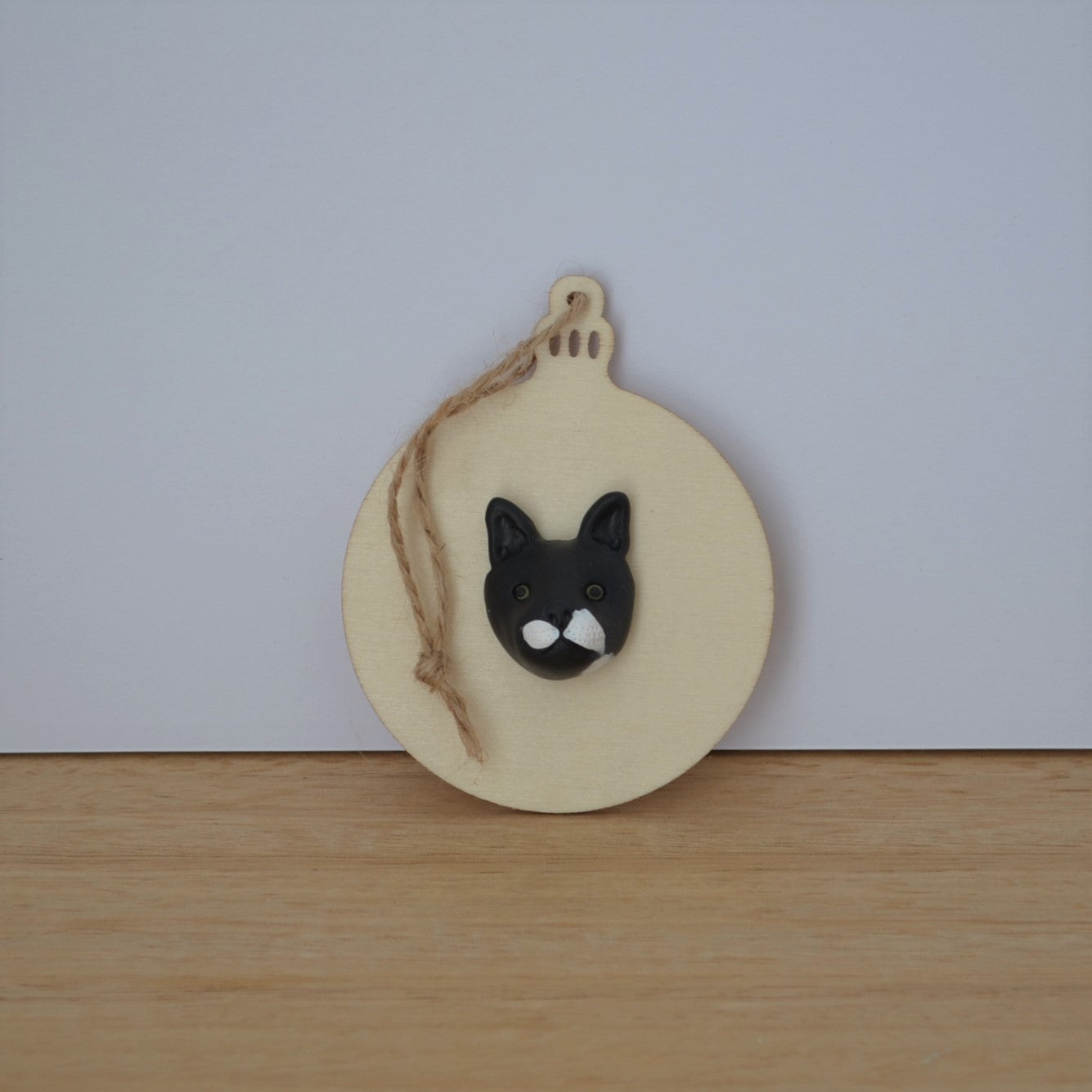 Bauble shaped timber Christmas ornament with polymer clay handmade cat face