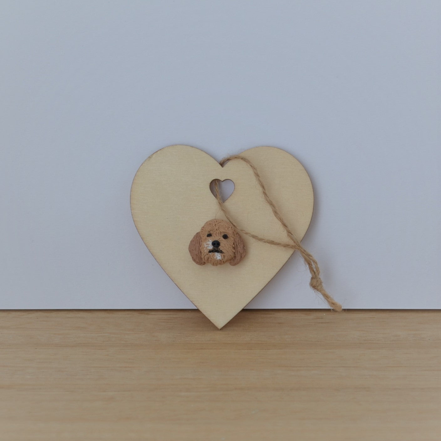 Heart shaped timber Christmas ornament with polymer clay handmade dog face