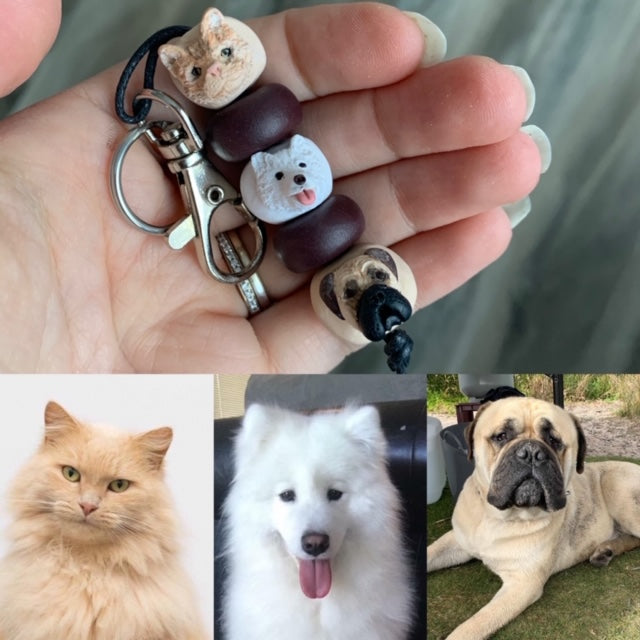custom pet keyring collage with photos of the cat and dogs that the key chain beads are modelled on.