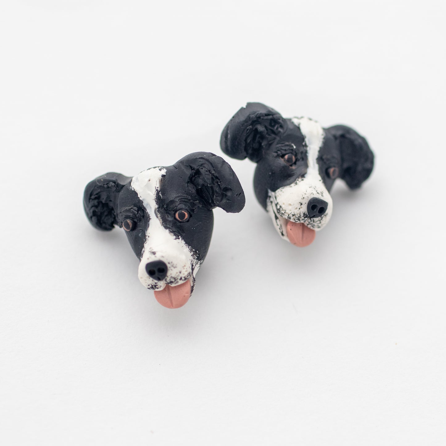 Handmade border collie dog earrings on white background