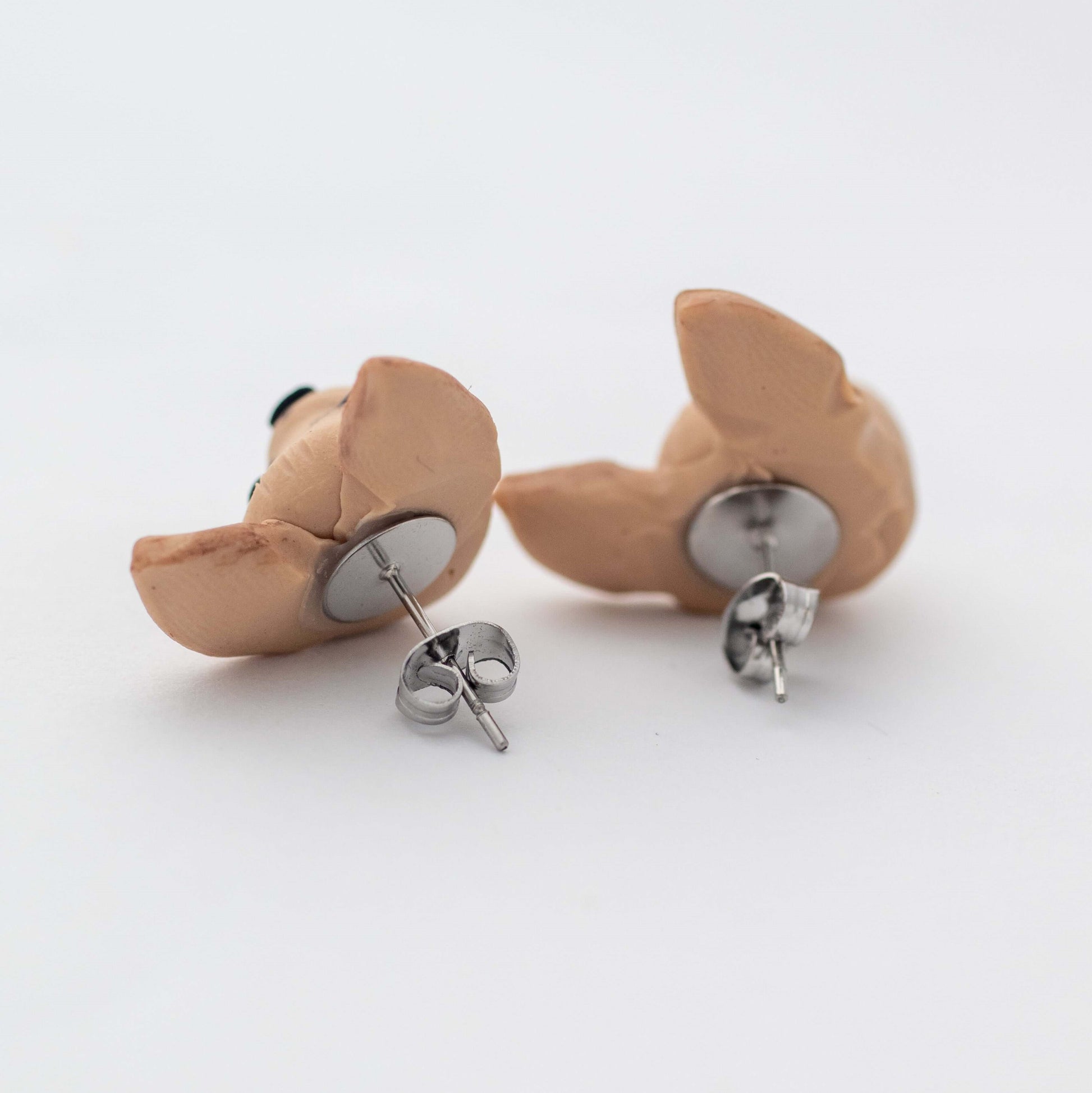 Handmade polymer clay chihuahua stud earrings showing surgical steel backs