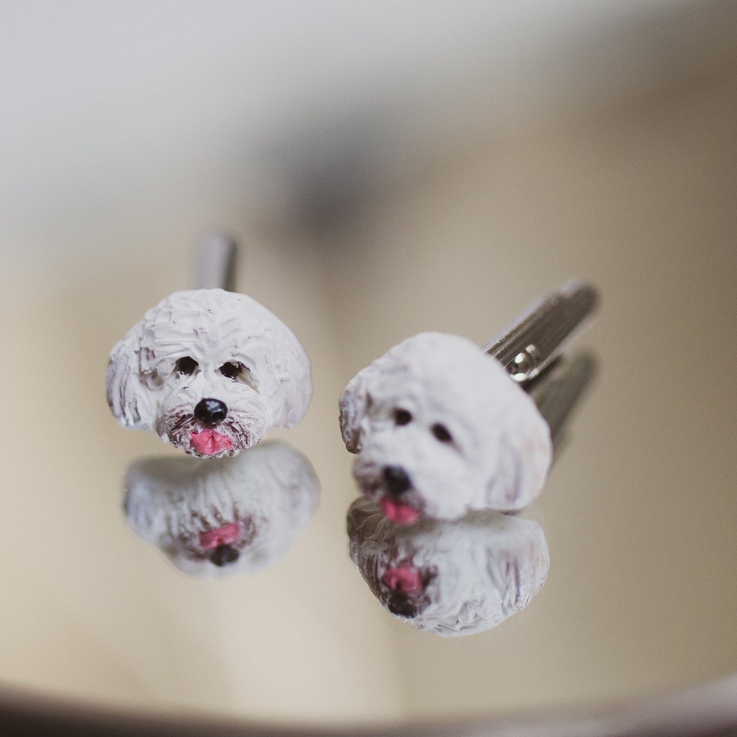 Close up shot of white dog handmade custom cufflinks