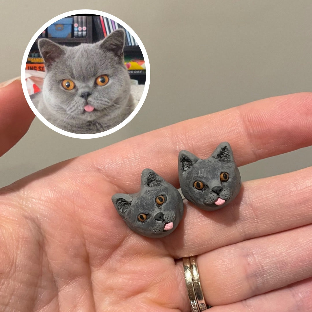 Handmade custom grey cat pet stud earrings made from polymer clay.