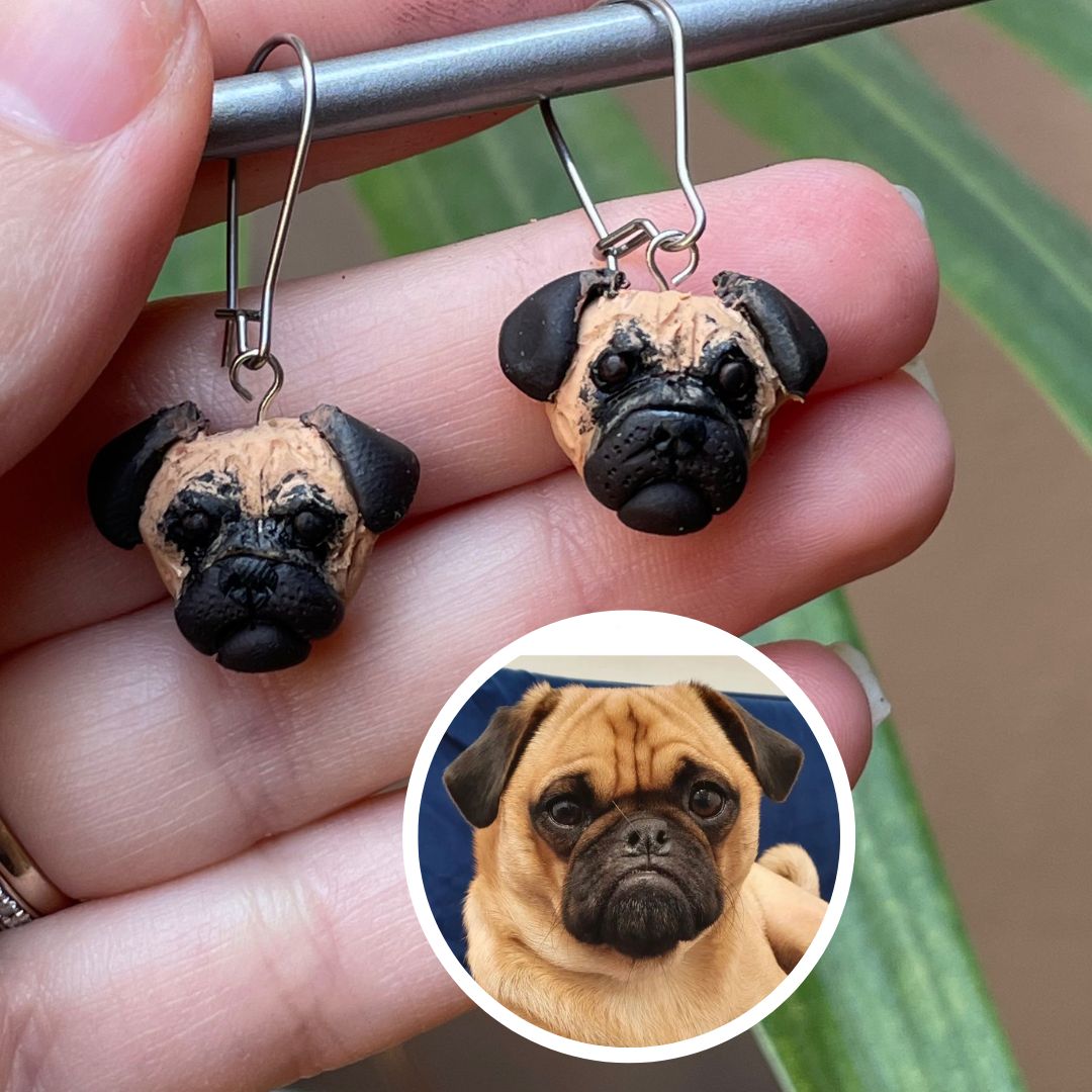 Handmade polymer clay dangle custom pet earrings of a pug dog.