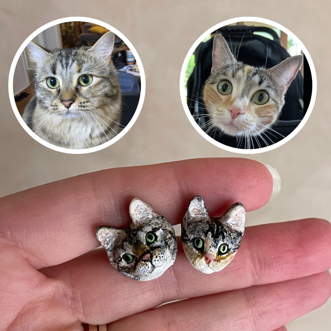 Handmade polymer clay custom pet stud earrings of 2 different tabby cats.