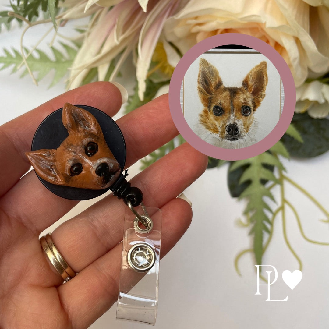 Handmade custom pet face badge reel showing a Jack Russell's face.