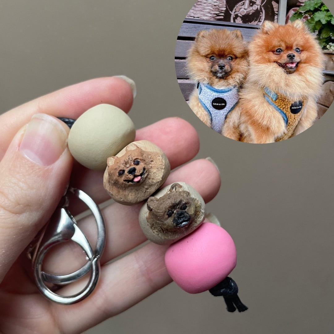 Handmade custom pet keyring with 2 individual dog face beads.